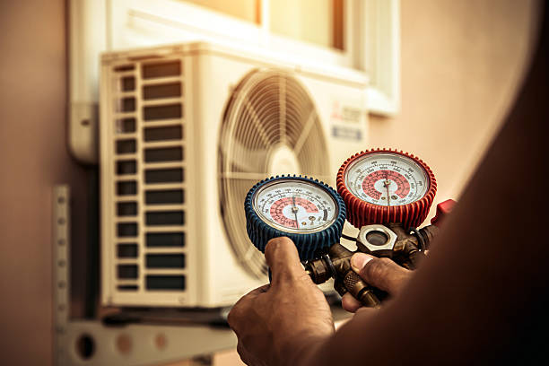 Professional Air Conditioning Service technician working in Dunbar, SC